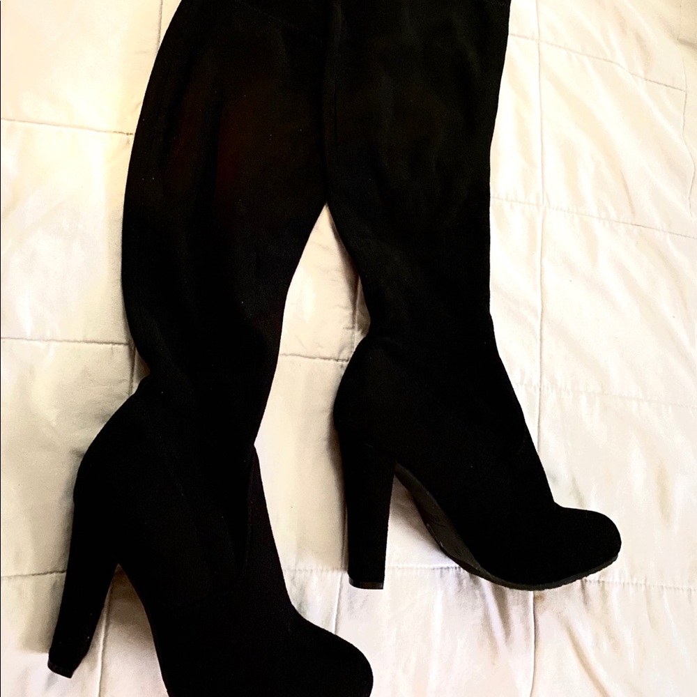 Black high thigh heel boots